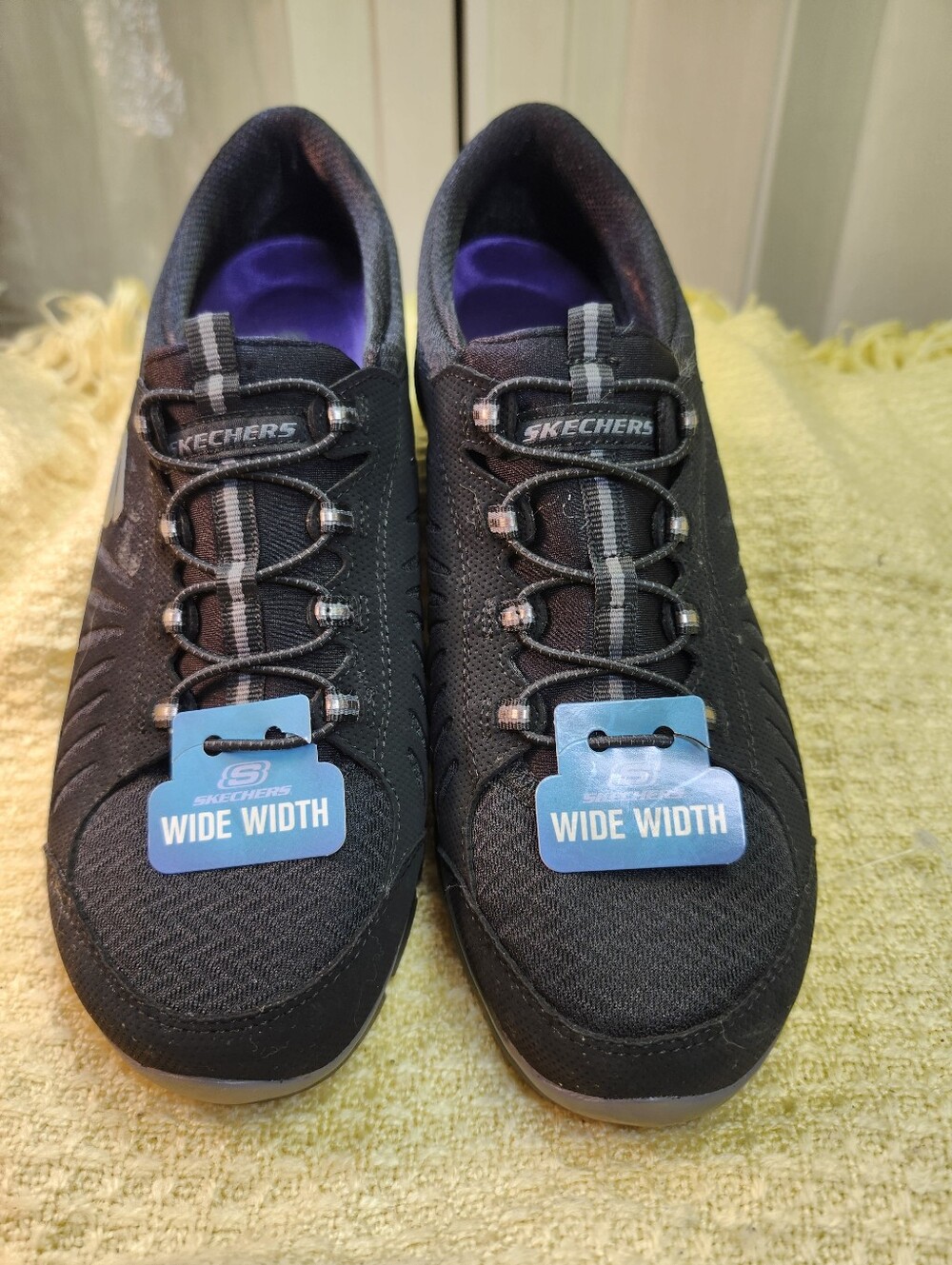 Skechers Black Wide Width Slip-On Athletic Sneakers with Purple Insole
